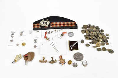 Lot 1611 - A collection of military and police badges and...