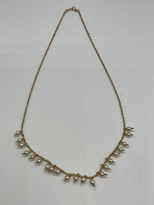 Lot 498 - A delicate Edwardian yellow metal and seed...