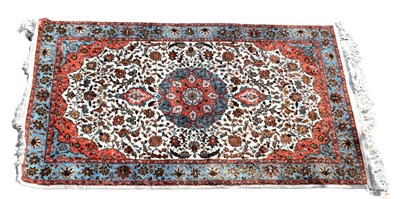 Lot 361 - A Persian designed floral rug with...