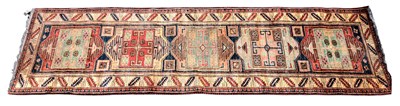 Lot 330 - A Caucasian runner with device set central...