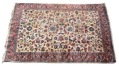 Lot 333 - A Persian designed rug with detailed floral...