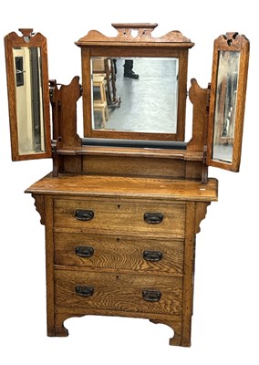 Lot 98 - An early 20th century oak dressing chest,...