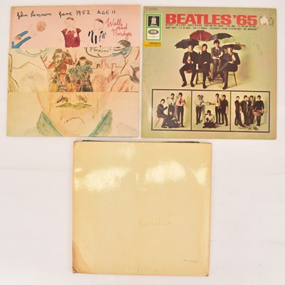 Lot 170 - THE BEATLES; three albums comprising 'The...