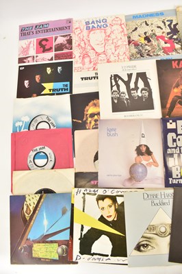 Lot 221 - ROCK & POP; over forty 7" singles to include...
