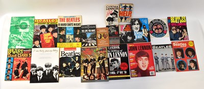 Lot 152 - THE BEATLES; a collection of books and...