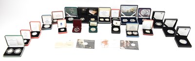 Lot 797 - A group of thirty-three cased silver proof...