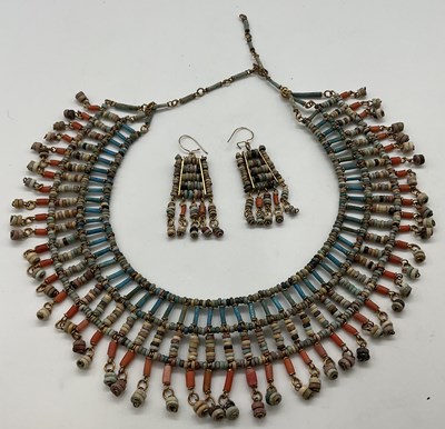 Lot 482 - An Egyptian necklace and pair of earrings...