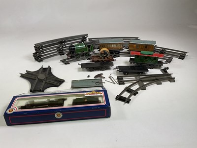 Lot 111 - A group of clockwork related train accessories...