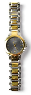 Lot 873 - GUCCI; a two-tone stainless steel wristwatch,...