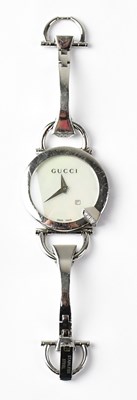 Lot 872 - GUCCI; a stainless steel wristwatch, the...