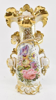 Lot 523 - A Continental floral decorated elborate...