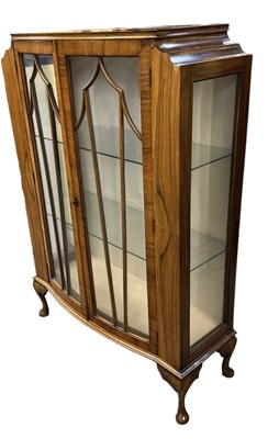 Lot 66 - A 1930s Art Deco walnut display cabinet with...