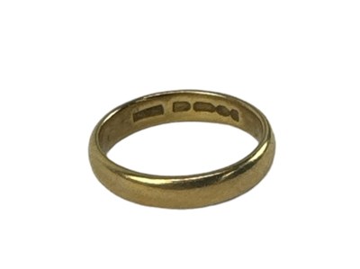 Lot 669 - A 22ct yellow gold wedding band, size O/P,...