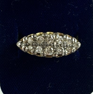 Lot 672 - An 18ct yellow gold diamond set ring...