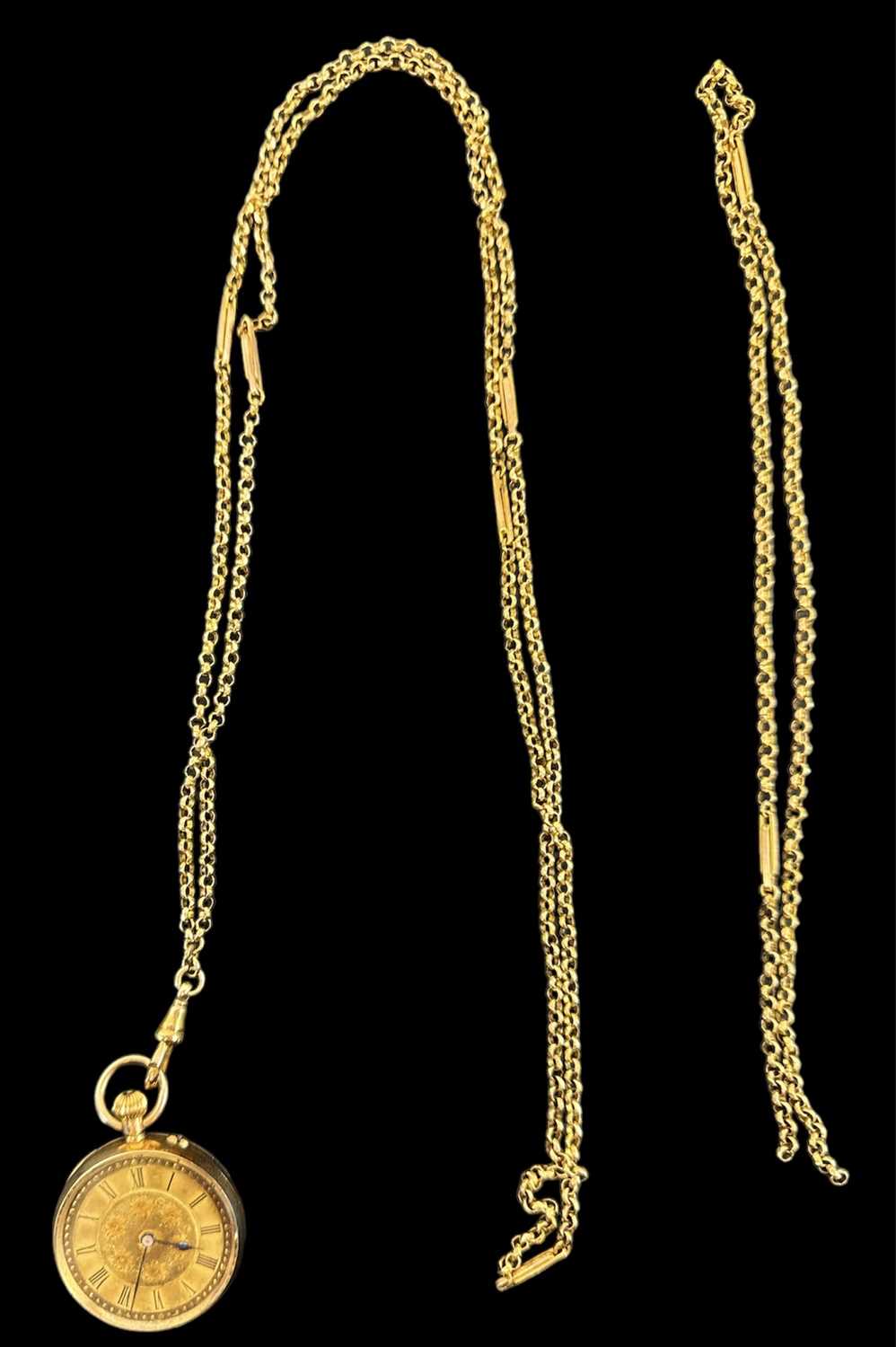 Lot 854 - A 14ct yellow gold lady's fob watch suspended...