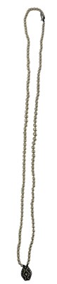 Lot 745 - A double strand of cultured pearls with white...