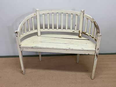 Lot 697 - An early 20th century wooden curved garden...