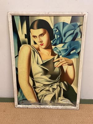 Lot 333 - An Art Deco style print of a woman in evening...