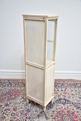 Lot 1144 - A modern white painted display cabinet with...