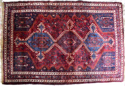 Lot 123 - A hand-knotted rug, with three central...