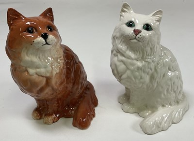 Lot 249 - BESWICK; two cats, height 23cm