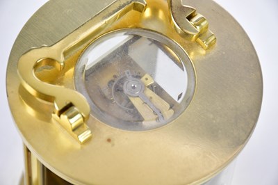 Lot 405 - A modern brass circular carriage timepiece,...