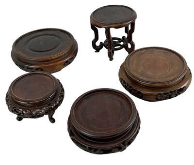 Lot 1161 - A group of five Chinese carved hardwood...