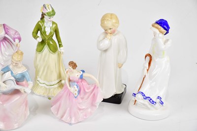 Lot 2709 - ROYAL DOULTON; a collection of nine figures,...