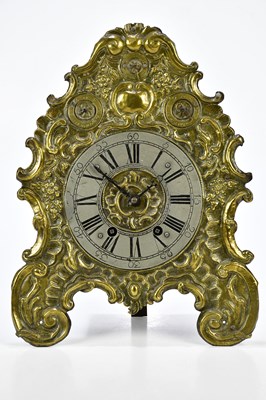 Lot 2147 - A gilt metal mantel clock, with repousse...