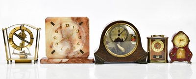 Lot 2144 - An Art Deco marble mantel clock, the dial set...