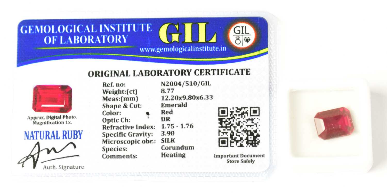 Lot 856 - A loose 8.77carat emerald cut ruby, with GIL