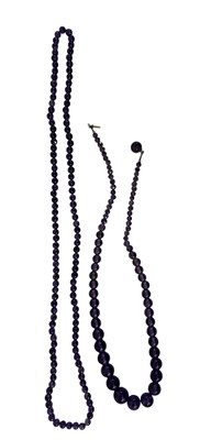 Lot 716 - An amethyst bead necklace, length 63cm, and...