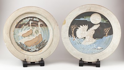 Lot 705 - WENDY NOLAN; two stoneware chargers decorated...