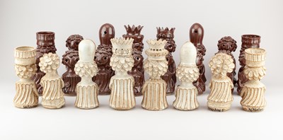 Lot 662 - WENDY NOLAN; a stoneware chess set covered in...