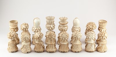 Lot 662 - WENDY NOLAN; a stoneware chess set covered in...