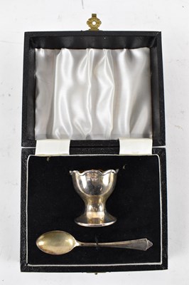 Lot 641 - A modern cased hallmarked silver egg cup and...