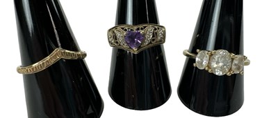 Lot 694 - A 9ct yellow gold amethyst set ring, size P, a...