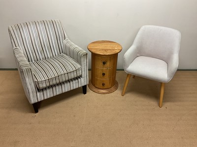 Lot 677 - Two modern easy chairs and a small three...