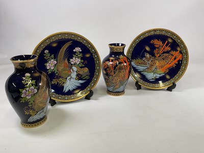 Lot 207 - Blue lacquer ceramics comprising two vases,...