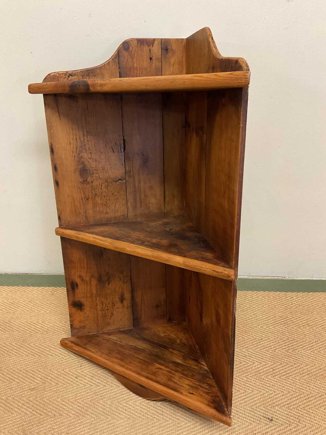 Lot 710 - A set of pine wooden corner shelves, height...