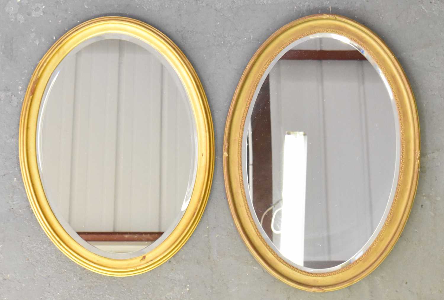 Lot 78 - A modern gilt framed oval wall miror, height...