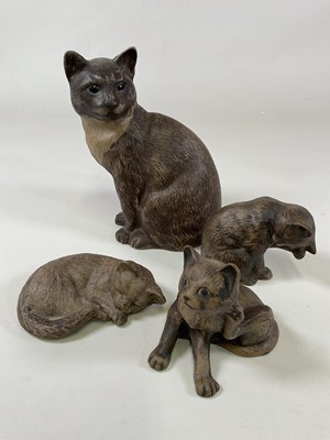 Lot 238 - POOLE POTTERY; four stoneware cats including a...