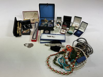 Lot 520 - A collection of costume jewellery including...