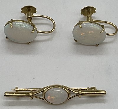 Lot 507 - A pair of 18ct yellow gold and opal screw back...