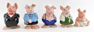 Lot 513 - A set of five Wade NatWest pigs.