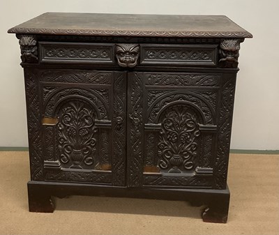 Lot 649 - An oak side cabinet, with a single drawer...