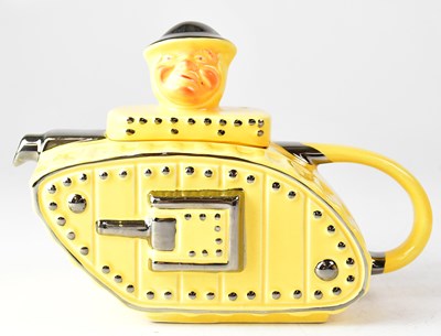 Lot 322 - A c.1930s teapot in the form of a tank with...