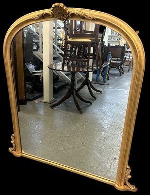 Lot 18 - A reproduction gilt framed overmantel wall...
