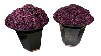 Lot 186 - A pair of modern flower displays on black...