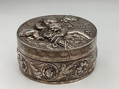 Lot 443 - A Continental silver trinket box, embossed...